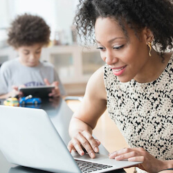 Mother and son with laptop Mother and son with laptop