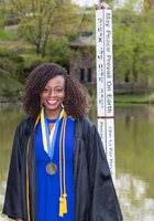 A photo of Ene, a tutor from Ithaca College