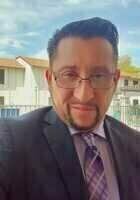 A photo of Gil, a tutor from Newman University