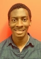 A photo of Joseph, a tutor from American University of Nigeria