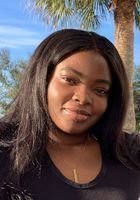 A photo of Abimbola, a tutor from Florida Institute of Technology