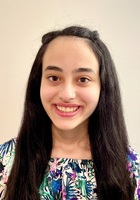 Online Grade 12 Physics tutor named Malak