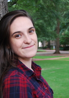 Online AP Physics C: Electricity and Magnetism tutor named Emma