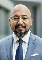A photo of Juan, a tutor from CNCI University