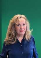 Online High School Economics tutor named Caroline