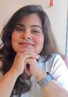 Online Grade 11 Physics tutor named Purva