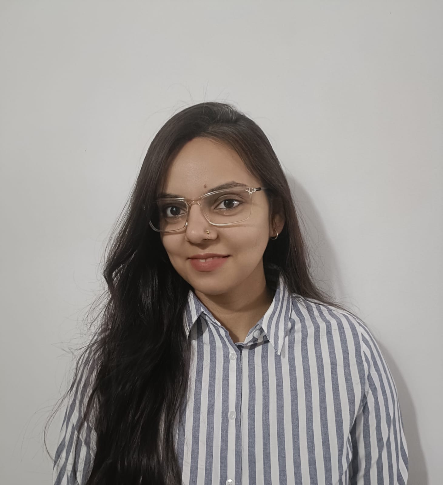 Online Grade 12 Physics tutor named Puneeta
