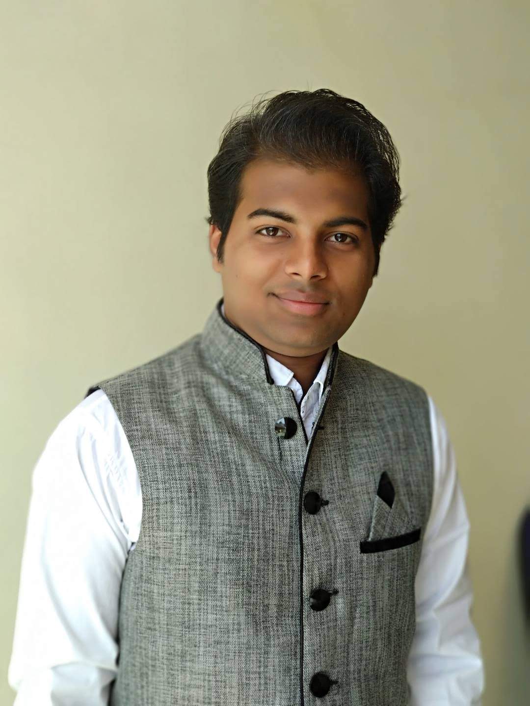 Online Quantum Mechanics tutor named Tushar