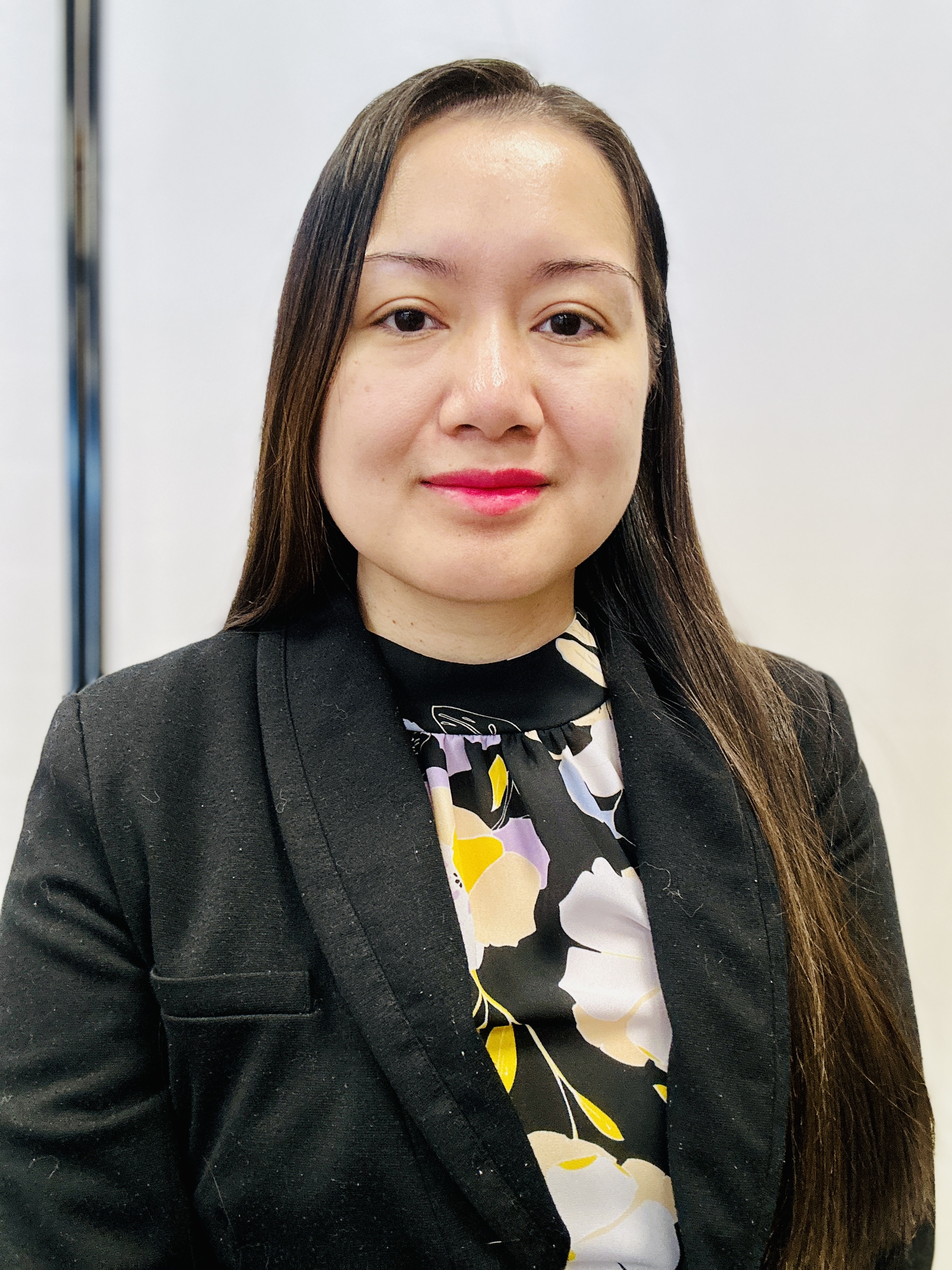 A photo of Rhea, a tutor from Walden University