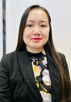 A photo of Rhea, a tutor from Walden University