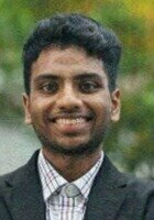 A photo of Karthikeyan, a tutor from Central Washington University
