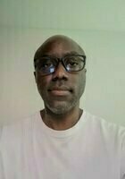 A photo of Amos, a tutor from Walden University
