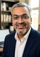 Online Grade 9 Math tutor named Ravi