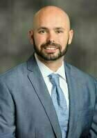 Online Managerial Economics tutor named Joshua