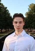 Online IB Economics tutor named Satchel